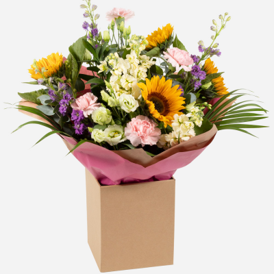 Bright Ideas Flower Bouquet - Beautiful Sunflowers and a peppering of other summer flowers and foliage. Tied in water and presented in a stylish bag. An amazing bouquet full of joy and delight ready to display and enjoy. These flowers will be hand delivered by the local florist.