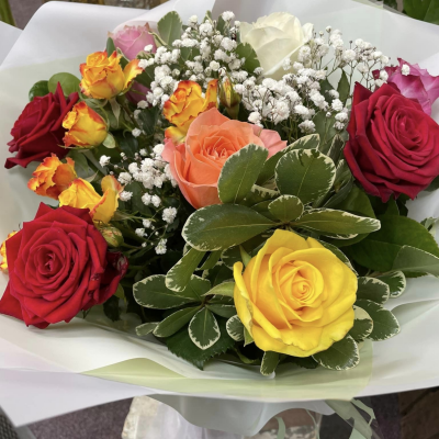Sweet Romance - A bouquet of mixed beautiful roses is sure to create a lasting impression.