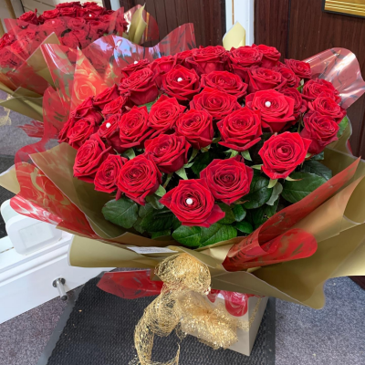 Ace of Hearts - Two dozen gorgeous red roses with a peppering of gyp and green. The definitive star of the show when it comes to flowers for loved ones.