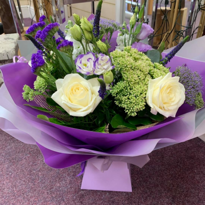 Cool Breeze - This classical stylish collection of flowers make this hand tied the perfect gift. Professionally arranged and delivered by a local florist. Flowers available for same day delivery when ordered before 2pm.