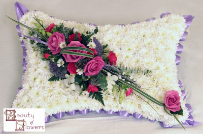 Based Pillow - The based Pillow tribute represents rest and comfort, a soft final place to lay the head. Delivered to any funeral director in Derby or Derbyshire
