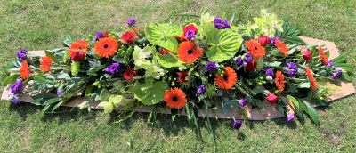 Vibrant Coffin Spray C170 - Vibrant coffin spray of flowers for a funeral in Derby and Derbyshire by Beauty of Flowers