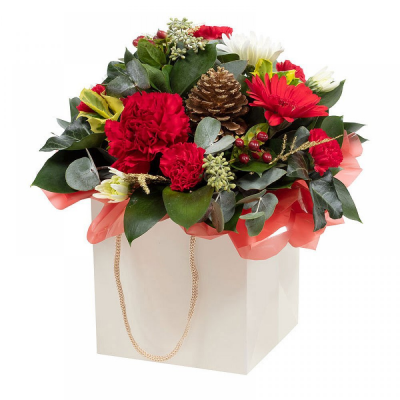 A Christmas Carol - A selection of customer favourite flowers and foliage in a design that’s simply the perfect Christmas present.