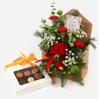 Letter to Santa - Flowers including Chocolates. This is the gift everybody will want this Christmas! The freshest flowers and finest foliage, arranged in a special envelope, delivered with a tasty b