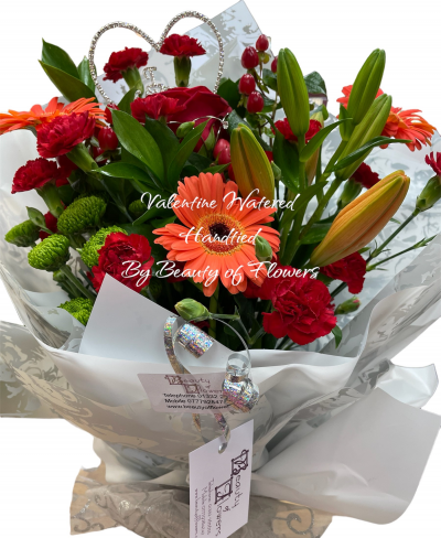 Valentine Watered Hand Tied - Valentine flowers delivered in Derby and Derbyshire by Beauty of flowers florist.