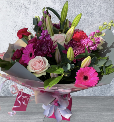 Pink Passion Watered Handtied - Watered Hand tied flowers delivered in Derby and Derbyshire by Beauty of Flowers Florist