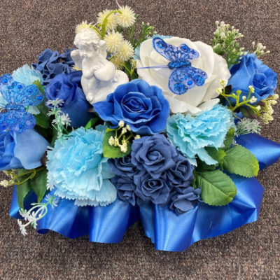 Artificial Blue Cherub Posy - Artificial funeral flowers by Beauty of Flowers Derby
Artificial Blue Cherub Posy. Size approx 12" by 8"