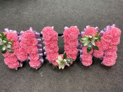 Pink MUM Letters - Artificial Funeral Flowers In Derby By Beauty of Flowers Florist
Artificial Pink Letters. Size Approx 36". Other Letters Are Available
