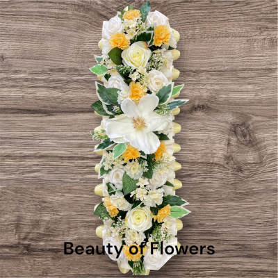 Artificial Yellow and White Flower Bar - This stunning and beautiful artificial Yellow and White Flower Bar comes in a size of approx. 25". Lovingly prepared personally by our talented florist in our Derby city store, each design is unique and individual. Flower variety may vary from the picture, but the colour will remain the same. This design can be made in other colour choices. We can also personalize this design with a ribbon sash with a name or short message. Please contact us to discuss your requirements. Artificial funeral flowers are becoming ever more popular due to the fact they last much longer and are a fraction of the price of fresh.