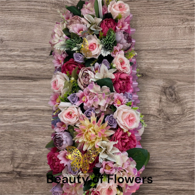 Artificial Pink Flower Bar - This stunning and beautiful artificial Pink Flower Bar comes in a size of approx. 24". Lovingly prepared personally by our talented florist in our Derby city store, each design is unique and individual. Flower variety may vary from the picture, but the colour will remain the same. This design can be made in other colour choices. We can also personalize this design with a ribbon sash with a name or short message. Please contact us to discuss your requirements. Artificial funeral flowers are becoming ever more popular due to the fact they last much longer and are a fraction of the price of fresh.