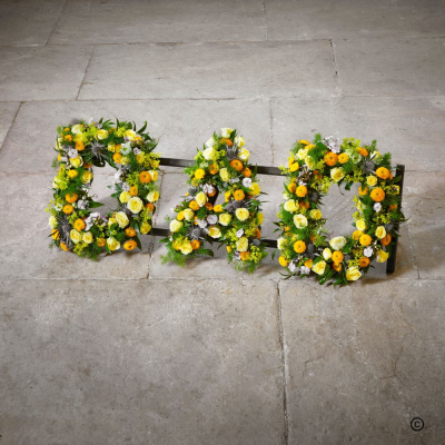 Yellow Loose DAD Letters OFP25(B) - The warm colours of sunshine inspire a garden full of memories for a treasured DAD. This tribute can be made in various colours and even made to denote a particular football team, sport or hobby. 
Any wording or name can be spelt. Prices start at £50.00 per letter.