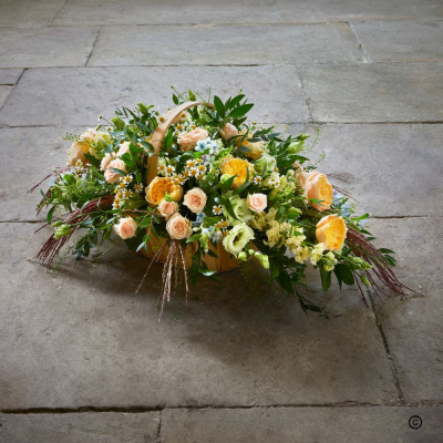 Pastel Sympathy Basket - A basket of flowers brimming with nature's abundance is an informal arrangement ideal for a gardener or flower lover. After the ceremony many people take this design home and place it next to a loved ones photo or take it to a nursing home.

Other colours are available.