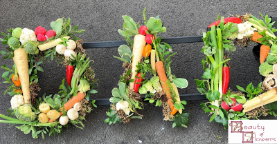 Vegetable Lettering - This Vegetable Letting is ideal for someone who loved growing or tended to their allotment. Any name or wording can be made and we use mixed vegetables that are in season at that particular time of the year.